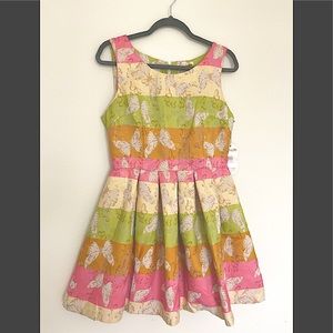 New Unique design puffy dress. Multicolored. Size 10